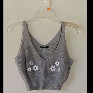 Embroidered flower plunge neck top